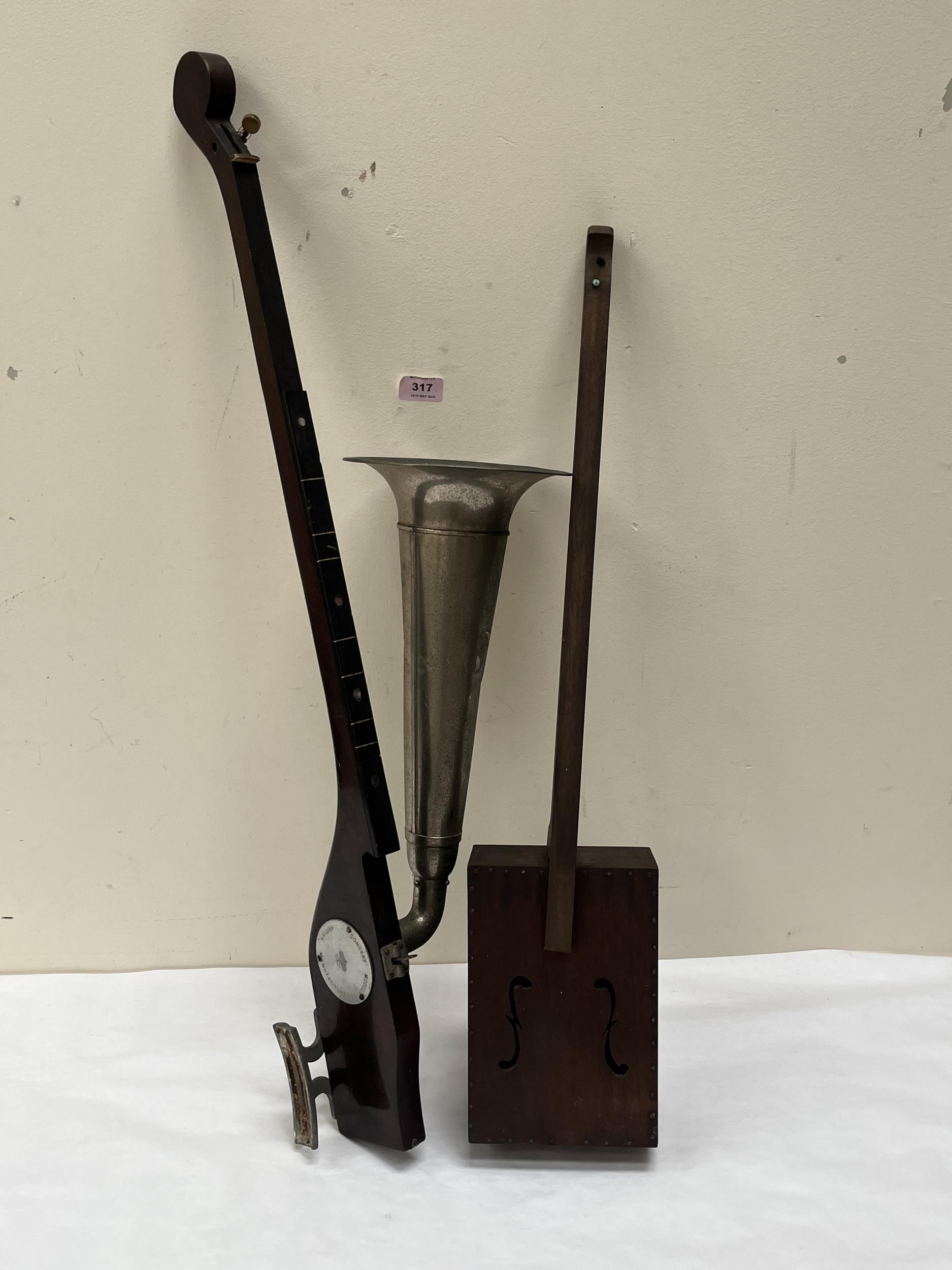 An early 20th Century Stroviols 'Concert Model' single string violin and another instrument.