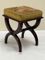 A Victorian mahogany stool with tapestry seat. 11" wide.