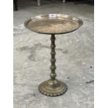 A 19th Century brass stand. 16" high.