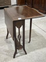 An Edward VII mahogany sutherland table with crossbanded top. 26" wide.