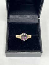 A 14ct 'mystic' topaz and diamond ring. 3.3g gross. Size P.