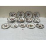 A part dessert service and other Dresden ceramics, all decorated with sprays of summer flowers.