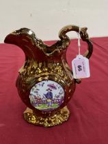 A 19th Century copper lustre jug decorated with chinoiserie panels. 8" high.