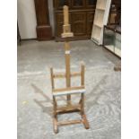 An artist"s studio easel. 42" high.