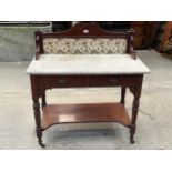 A Victorian washstand with marble top and tiled splashback. 36" wide.