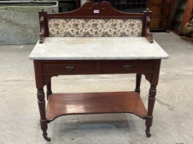 A Victorian washstand with marble top and tiled splashback. 36" wide.