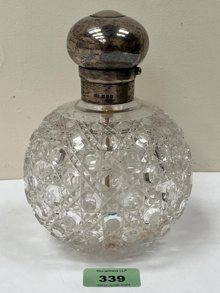 A Victorian hobnail cut glass scent bottle with silver top. London 1901. 6¾" high.