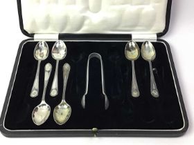 SET OF SIX SILVER TEASPOONS AND SUGAR TONGS, AND A SET SIX SILVER COFFEE SPOONS