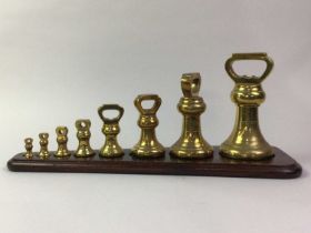 COLLECTION OF BRASS BELL WEIGHTS, ALONG WITH A JELLY PAN