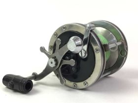 THREE SEA FISHING MULTIPLIER REELS, ALONG WITH A BOAT ROD