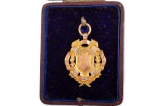 EDWARD VII SCHOOL MEDAL, IN NINE CARAT GOLD