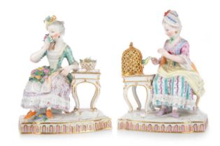 TWO PORCELAIN FIGURES REPRESENTING THE SENSES, AFTER THE MODELS OF J. C. SCHONHEIT FOR MEISSEN