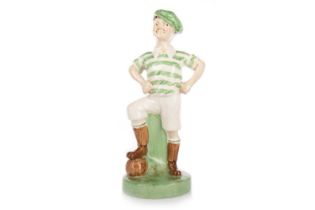 CELTIC F.C., BRITANNIA POTTERY 'WEE MACGREGOR' FIGURE, CIRCA 1900