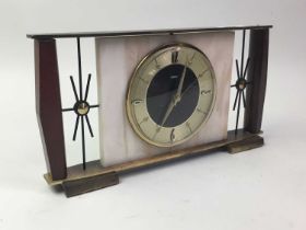 ONYX AND BRASS MANTEL CLOCK, ALONG WITH A DEMI LUNE TABLE