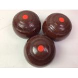 THOMAS TAYLOR, SET OF FOUR LIGNOID LAWN BOWLS