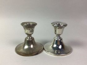 PAIR OF SILVER CANDLESTICKS, AND FOUR SILVER NAPKIN RINGS