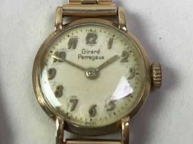 NINE CARAT GOLD GIRARD PERREGAUX WRIST WATCH,