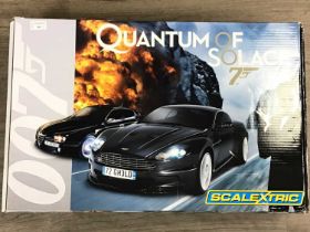 SCALEXTRIC QUANTUM SOLACE 007 SET, AND A SCALEXTRIC TRACK EXTENSION PACK