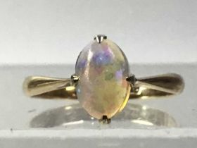 GOLD AND OPAL RING,
