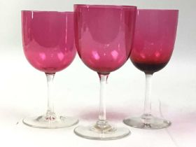 GROUP OF COLOURED DRINKING GLASSES,