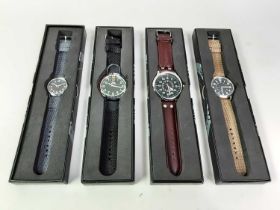 GROUP OF FOUR EAGLEMOS COLLECTIONS WATCHES,