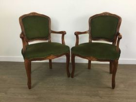 PAIR OF WALNUT ARMCHAIRS, AND TWO FOOTSTOOLS