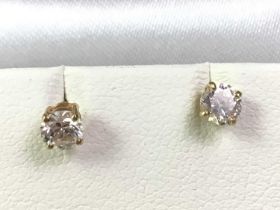 PAIR OF GOLD DIAMOND STUD EARRINGS,