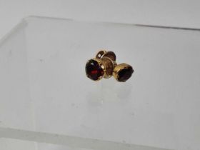 PAIR OF GARNET STUD EARRINGS,