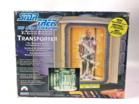 STAR TREK THE NEXT GENERATION TRANSPORTER, ALONG WITH A STAR WARS ATTACK OF THE CLONES YODA SHOP DIS