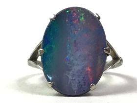 NINE CARAT WHITE GOLD AND TRIPLET OPAL RING,