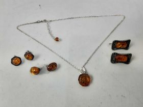 GROUP OF SILVER AND AMBER JEWELLERY,