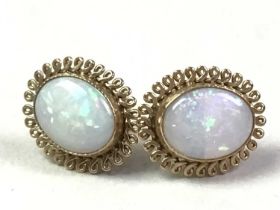 PAIR OF NINE CARAT GOLD AND OPAL EARRINGS ,