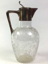 VICTORIAN GLASS AND PLATED CLARET JUG, ALONG WITH THREE OTHER DECANTERS