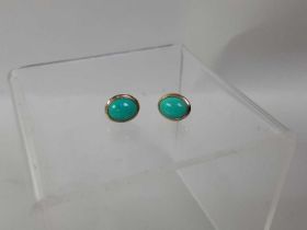 PAIR OF FOURTEEN CARAT GOLD AND TURQUOISE EARRINGS,
