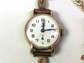 NINE CARAT GOLD TUDOR WRIST WATCH AND CHAIN,