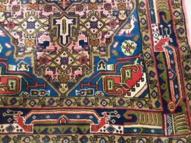 PERSIAN HERIZ RUG, 20TH CENTURY