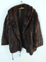 TWO FUR COATS, ALONG WITH THREE FUR STOLES