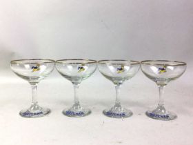 COLLECTION OF GLASS CHAMPAGNE COUPES, BRANDED FOR BABYCHAM