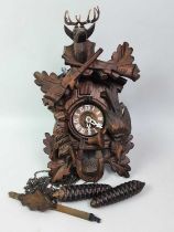 BLACK FOREST CUCKOO CLOCK, ALONG WITH TWO MAHOGANY MANTEL CLOCKS