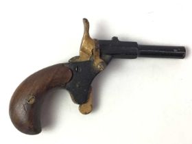 EARLY 20TH CENTURY CAP GUN, AND OTHER ITEMS