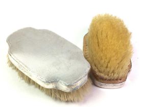 TWO SILVER BACKED HAIR BRUSHES,