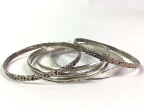GROUP OF SILVER BANGLES, AND THREE WHITE METAL BANGLES