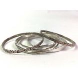 GROUP OF SILVER BANGLES, AND THREE WHITE METAL BANGLES