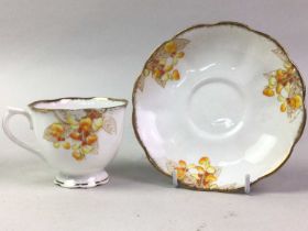 ROYAL ALBERT LABURNUM PART TEA SET, AND A ROYAL ALBERT COUNTRY ROSES PART TEA SET