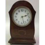 FRENCH MAHOGANY MANTEL CLOCK WITH DOMED TOP, AND A STAINED OAK MANTEL CLOCK