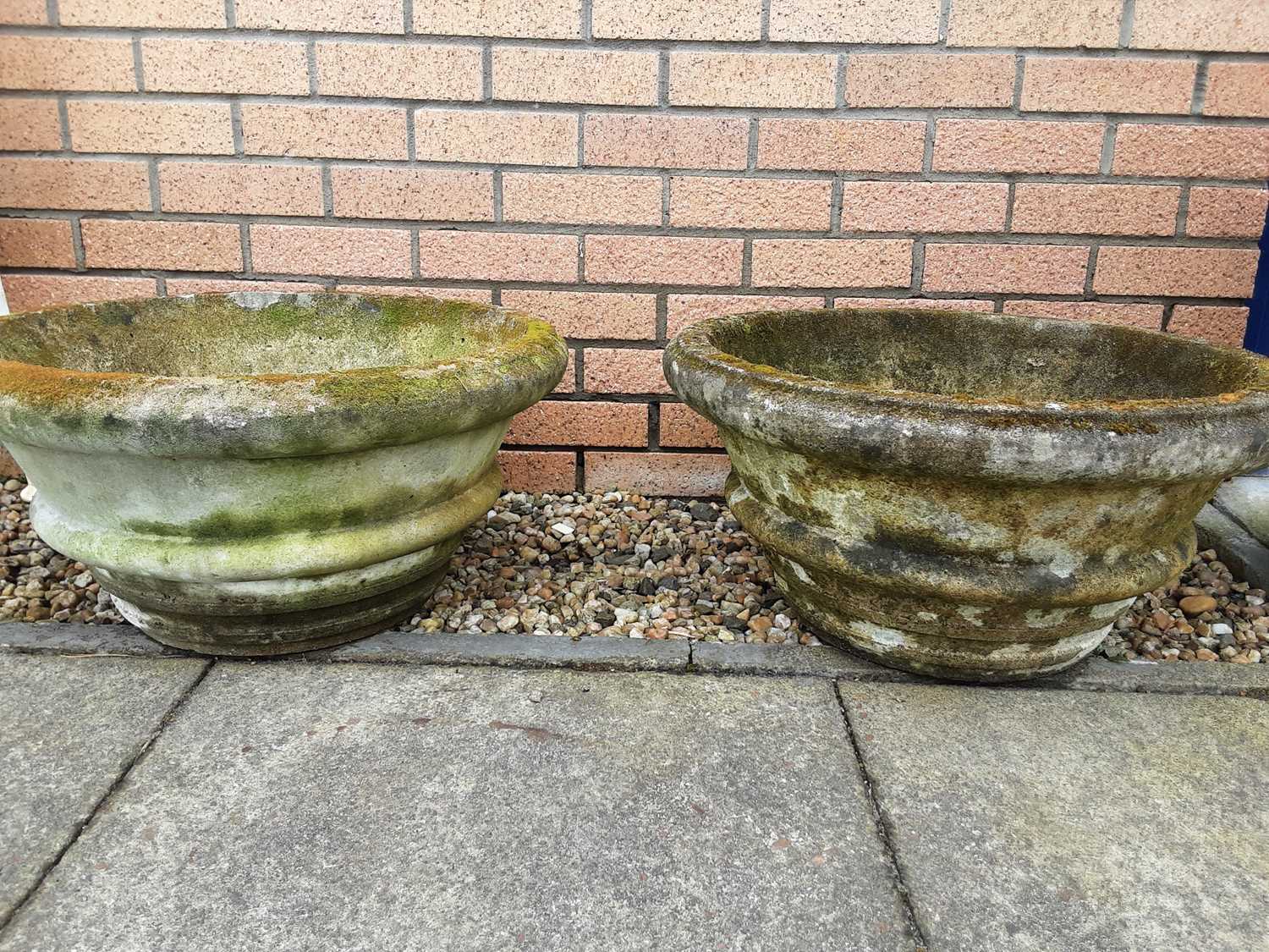 PAIR OF COMPOSITE STONE PLANTERS,