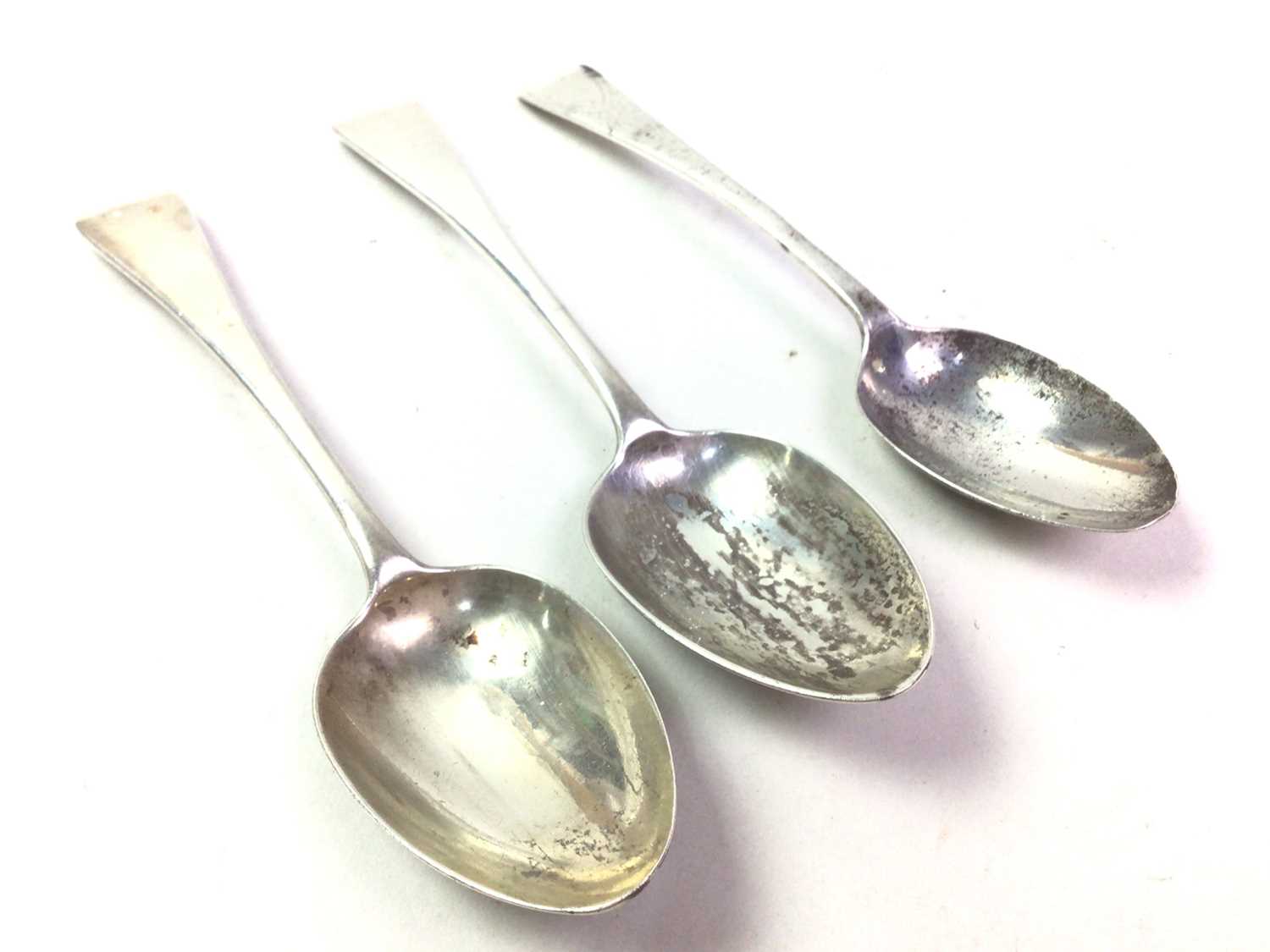 THREE SILVER DESSERT SPOONS, 19TH CENTURY, AND A SILVER PEPPER POT