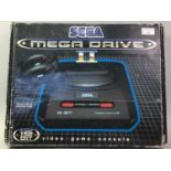 SEGA MEGA DRIVE, ALONG WITH TWO GAMES