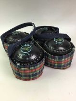 SET OF FOUR TAYLORS LAWN BOWLS,