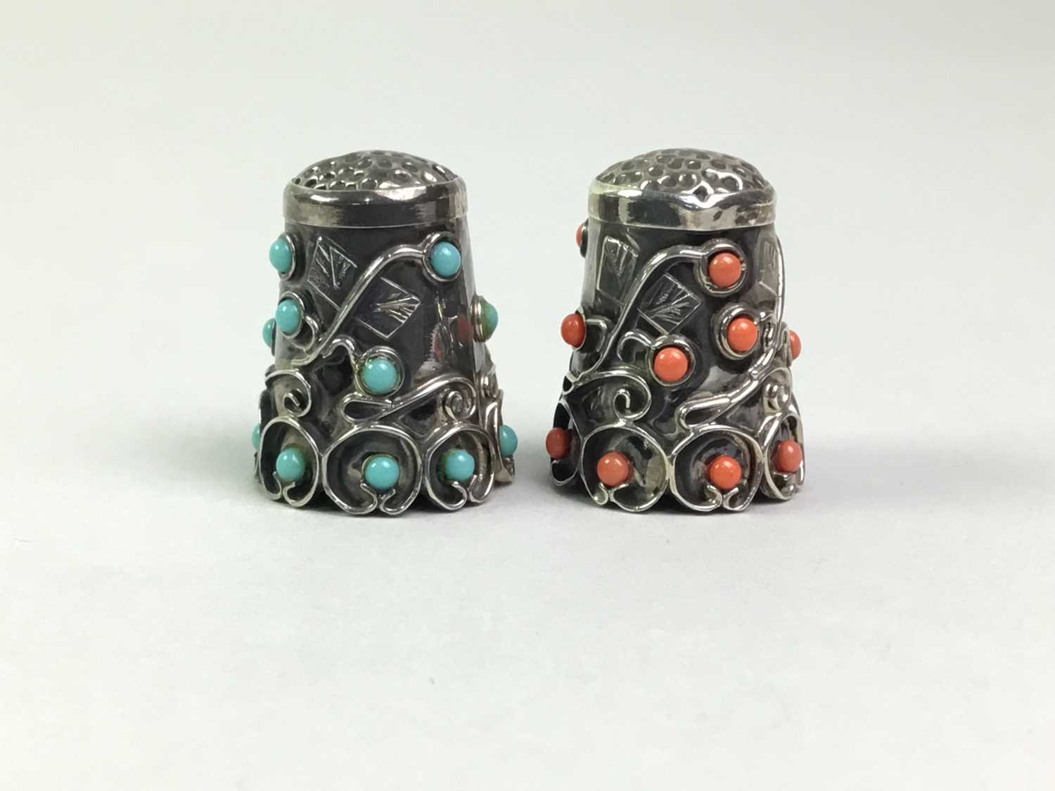 TWO SILVER THIMBLES,